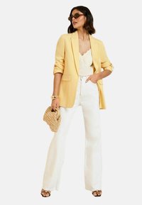 Длинный блейзер