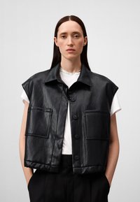 Жилет Жилет