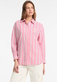 Длинная блузка