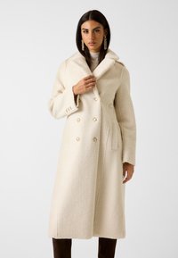 Шерстяное пальто