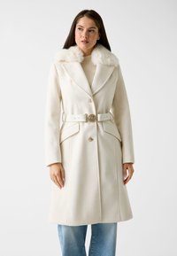 Шерстяное пальто