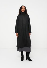 Шерстяное пальто