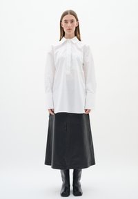 Длинная блузка