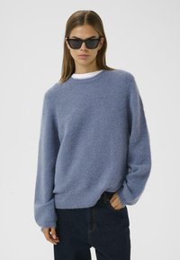 Длинный пуловер