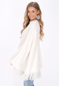 Длинный пуловер Длинный пуловер