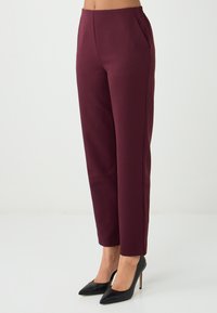 Узкие брюки