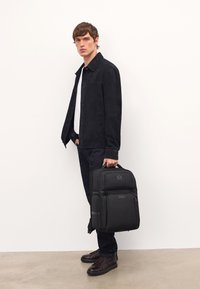 Кожаная сумка