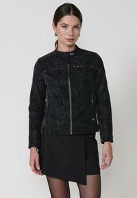 Кожаная куртка