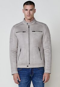 Кожаная куртка Кожаная куртка