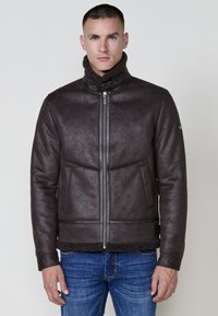 Кожаная куртка Кожаная куртка