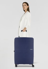 Чемодан на колесах