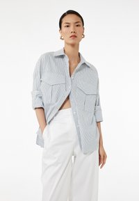 Блузка-рубашка