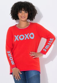 Длинный пуловер