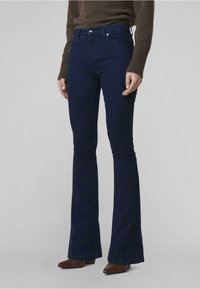 Клешеные брюки