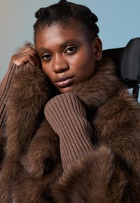 Шерстяное пальто