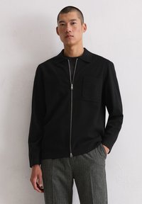 Вязаная кофта