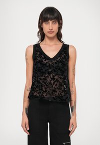 Блузка без рукавов