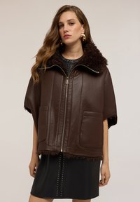 Кожаная куртка