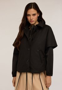 Куртка с накладнымит карманами