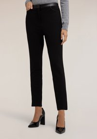 Узкие брюки