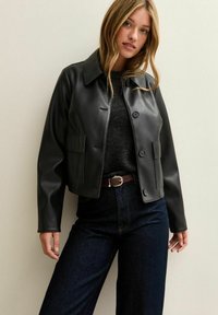 Кожаная куртка