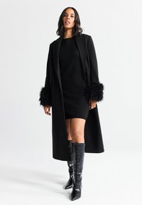 Шерстяное пальто