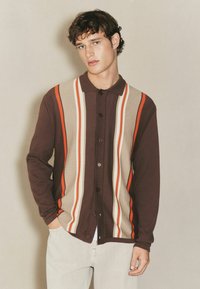 Вязаная кофта