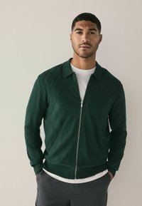 Вязаная кофта