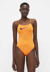 Слитный купальник