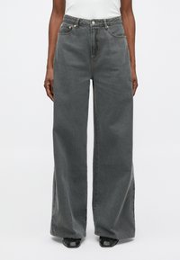 Джинсы бойфренда