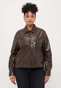 Кожаная куртка