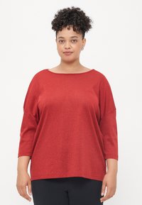 Длинный пуловер