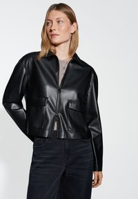 Кожаная куртка