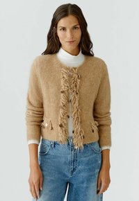 Пуховой жилет Пуховой жилет