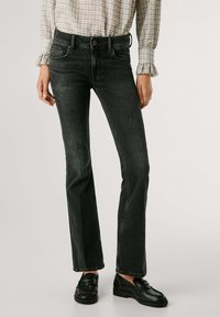 Клешеные брюки