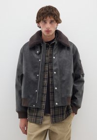 Кожаная куртка