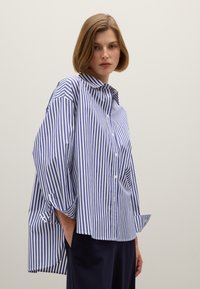 Длинная блузка Длинная блузка