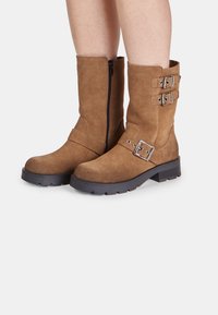 Ковбойские сапоги