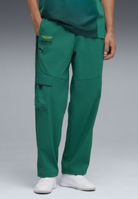 Брюки с накладными карманами Брюки с накладными карманами