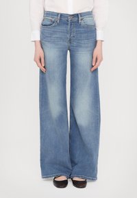 Джинсы бойфренда