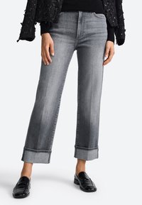 Короткие джинсы