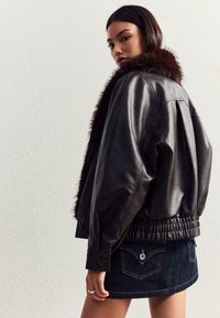 Кожаная куртка