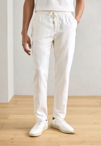 Льняные брюки