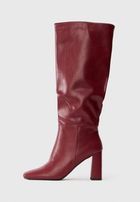 Высокие сапоги