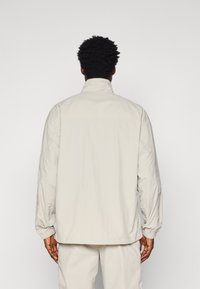 Куртка-дождевик