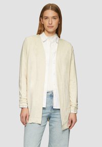 Длинный жилет