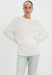 Длинный пуловер