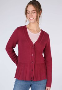 Длинный жилет