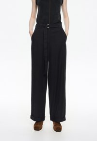 Широкие брюки Широкие брюки