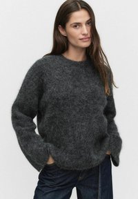 Длинный пуловер